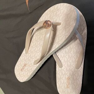 Michael Kors pink flip flops